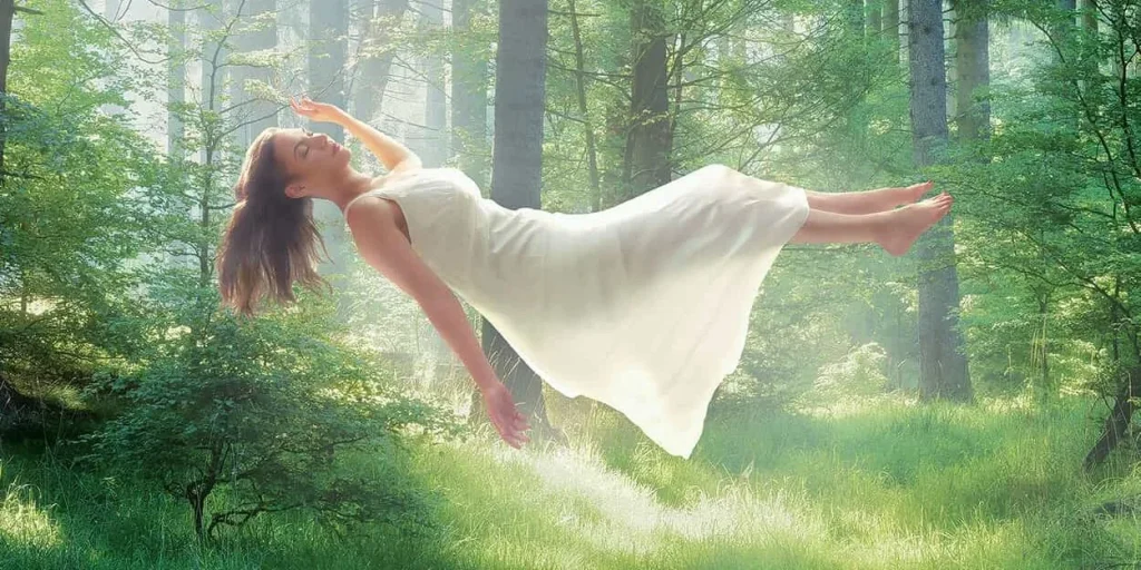 A woman floating in a forest, demonstrating the feeling of zero gravity support that comes with our adjustable beds.